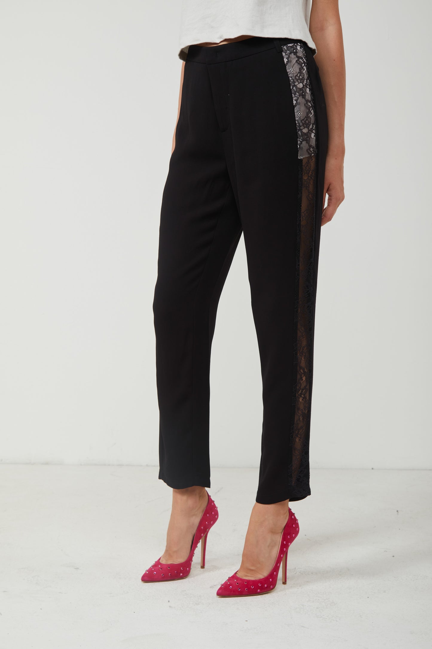 PINKO Black trousers with lace on the side