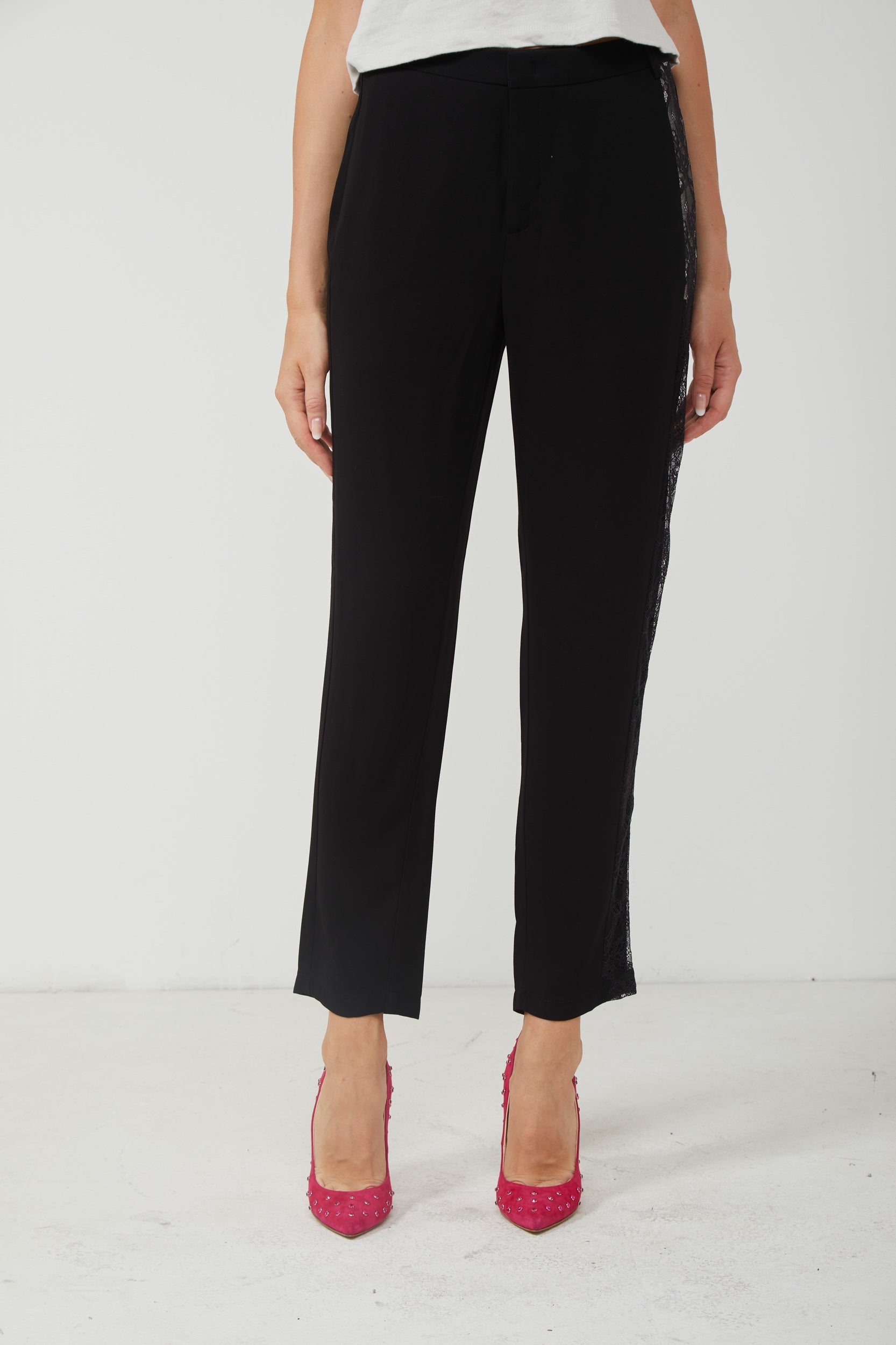 PINKO Black trousers with lace on the side