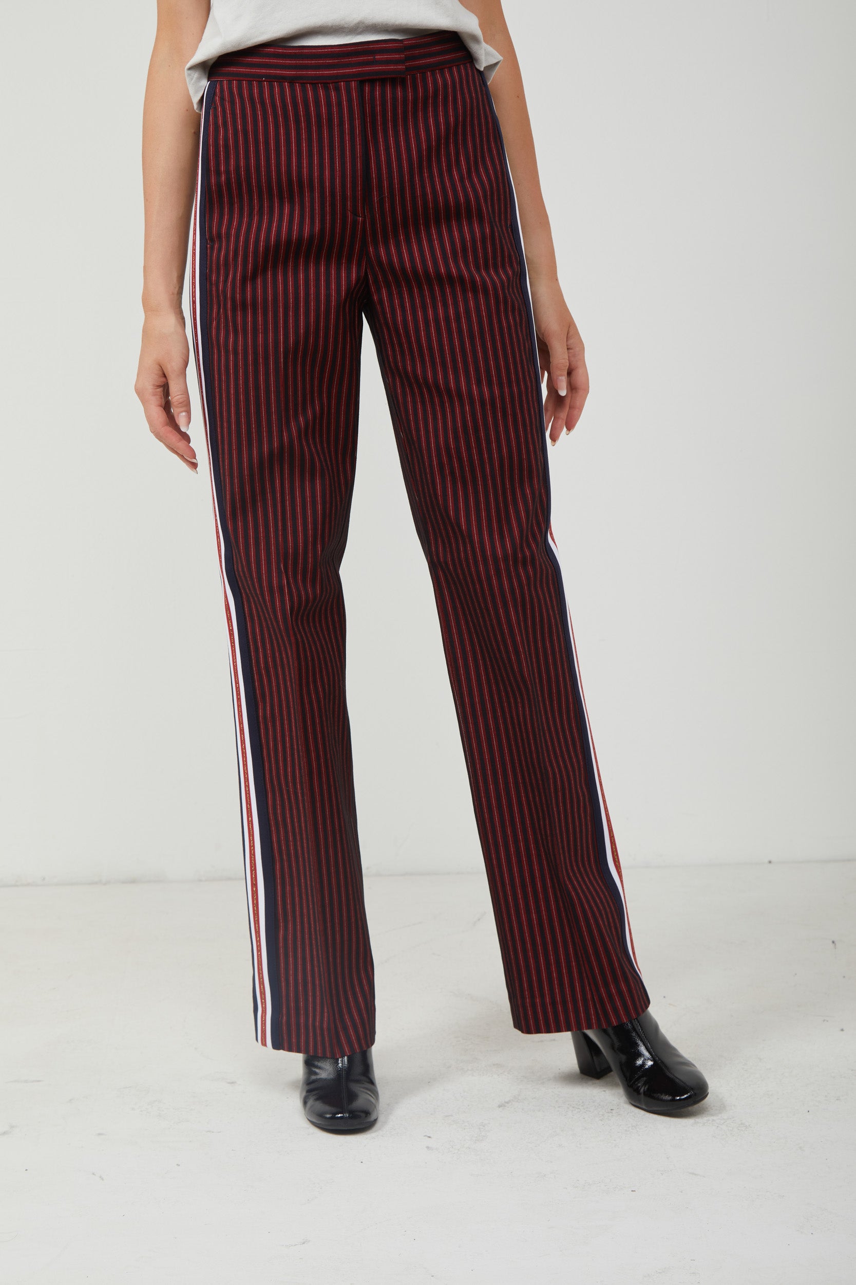 Pinstripe trousers with red stripe